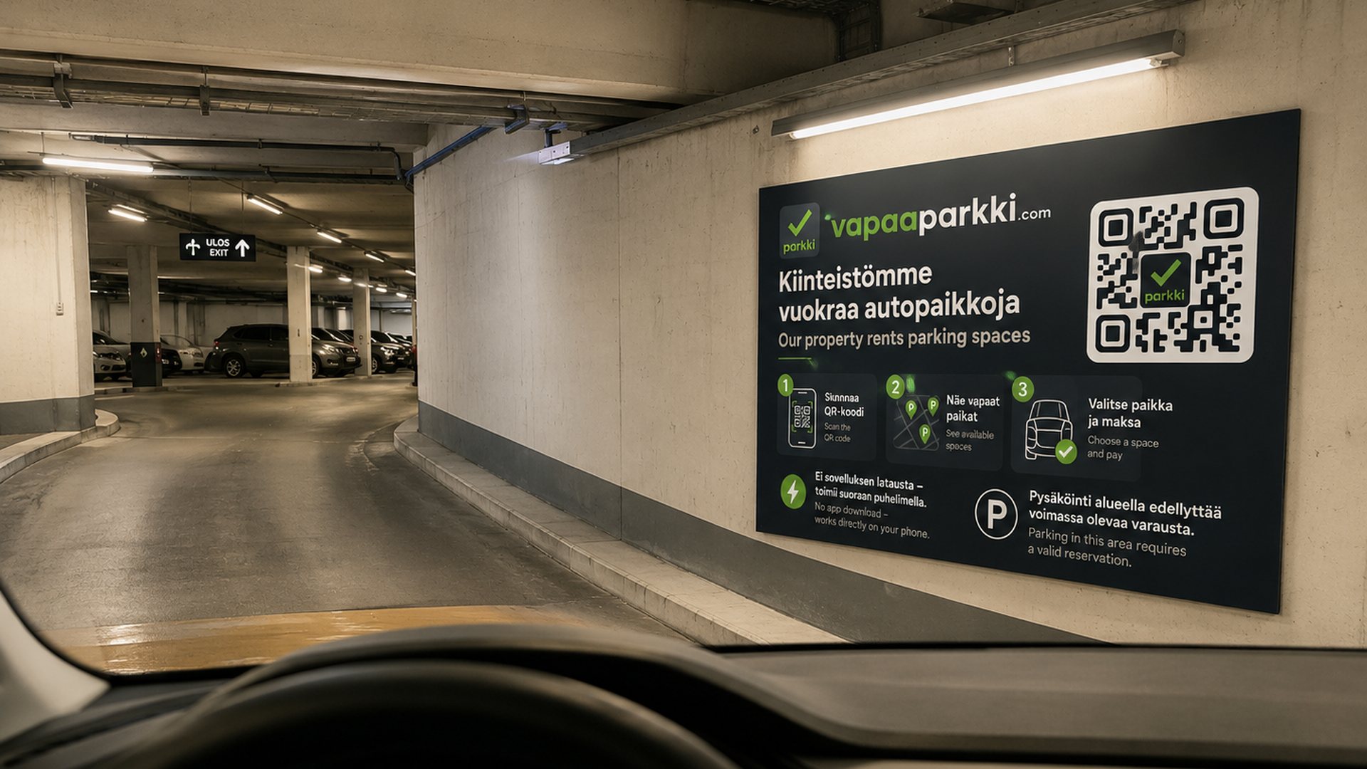 VapaaParkki-opaste pysäköintihallin seinällä autosta katsottuna.